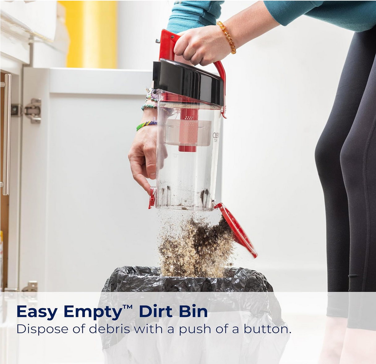 BISSELL CleanView Compact Upright Vacuum standing with cleaning attachments